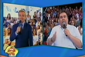 Em 2003, Gugu e Faustão apareceram juntos, ao vivo, em uma ação de marketing de uma empresa (Foto: TV Globo/Reprodução) 